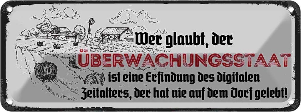 Blechschild 10x27 cm Überwachungsstaat Dorf Spruch Zitat